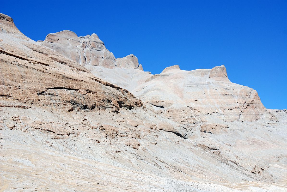 20 Gesar Ling Peak And Saddle Of Gesar On The West Side Of Lha Chu Valley On Mount Kailash Outer Kora The peak north of Ushinisha Vijaya is called Gesar Ling Peak, named after the hero-king of Tibet�s folk story. The rock ridge below is called the saddle of Gesar.